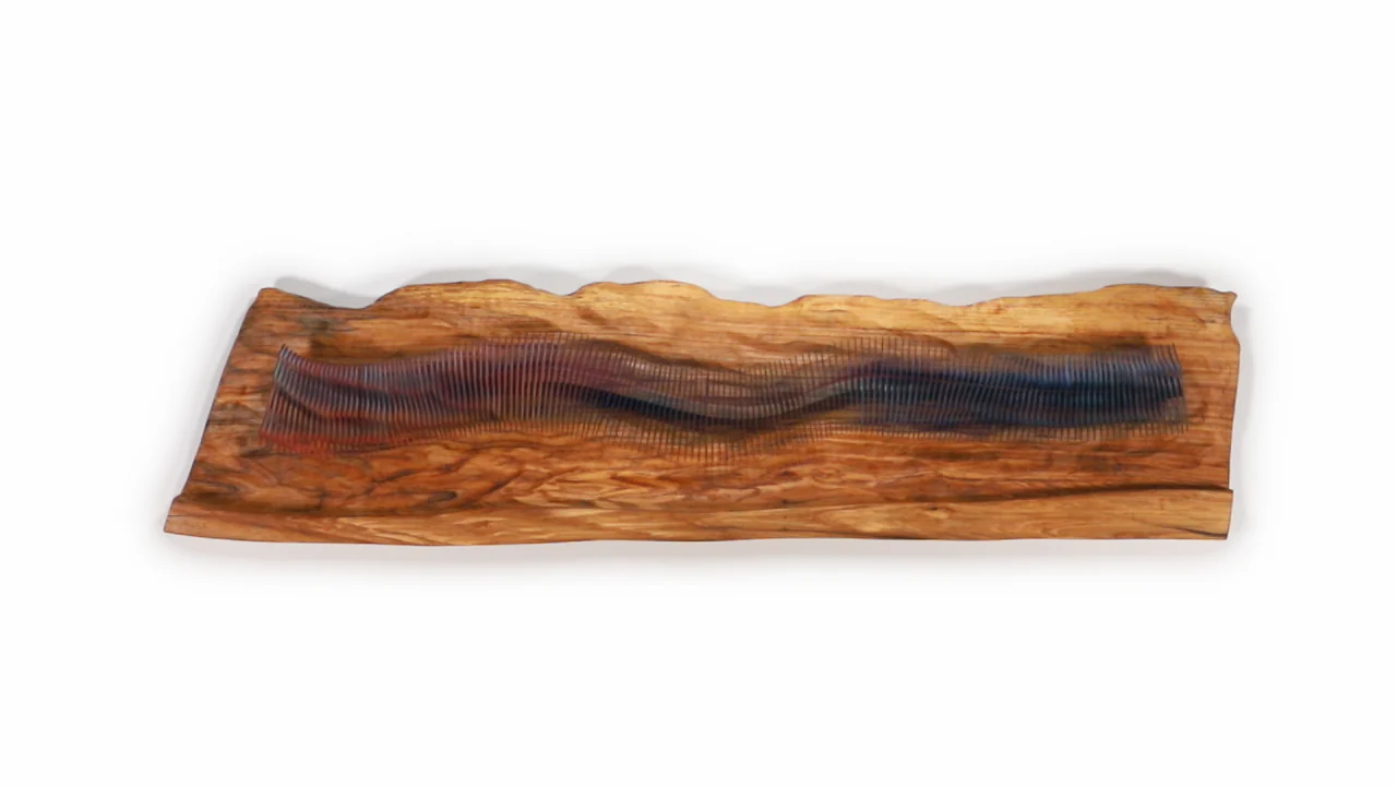 Ash Wood River, a sculptural work shown from a changing viewpoint